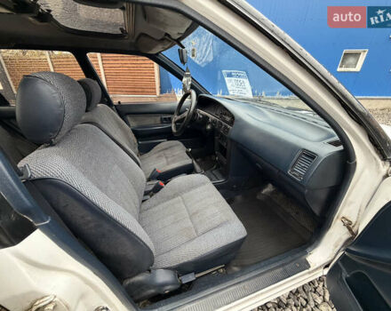 Білий Тойота Королла, об'ємом двигуна 1.3 л та пробігом 300 тис. км за 1300 $, фото 18 на Automoto.ua