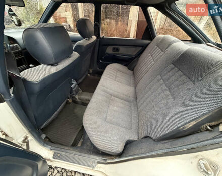 Білий Тойота Королла, об'ємом двигуна 1.3 л та пробігом 300 тис. км за 1300 $, фото 14 на Automoto.ua