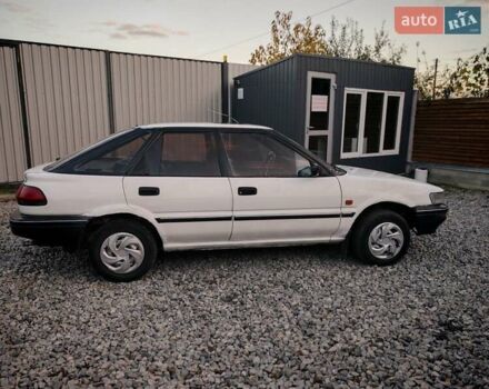 Белый Тойота Королла, объемом двигателя 1.3 л и пробегом 270 тыс. км за 1300 $, фото 9 на Automoto.ua