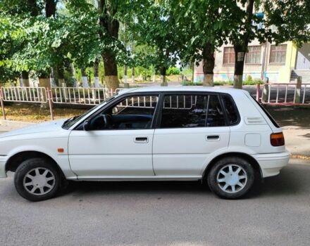 Білий Тойота Королла, об'ємом двигуна 1.3 л та пробігом 214 тис. км за 1400 $, фото 1 на Automoto.ua