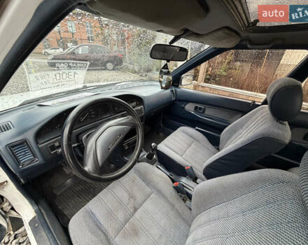 Белый Тойота Королла, объемом двигателя 1.3 л и пробегом 350 тыс. км за 1200 $, фото 12 на Automoto.ua