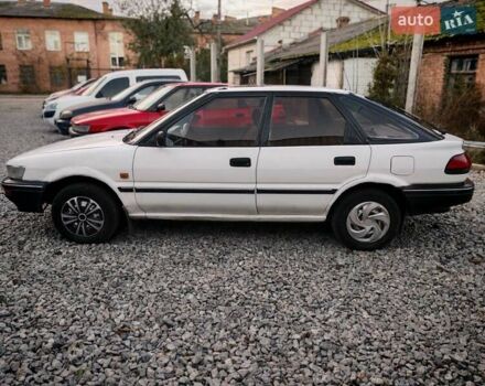 Белый Тойота Королла, объемом двигателя 1.3 л и пробегом 270 тыс. км за 1300 $, фото 5 на Automoto.ua