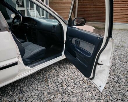 Белый Тойота Королла, объемом двигателя 1.3 л и пробегом 300 тыс. км за 1300 $, фото 12 на Automoto.ua