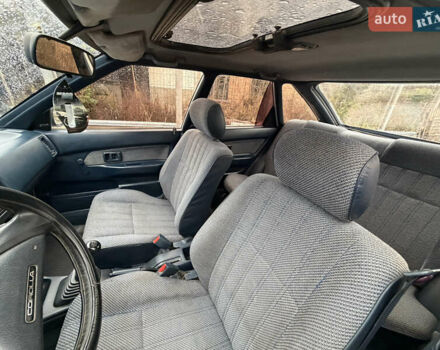 Белый Тойота Королла, объемом двигателя 1.3 л и пробегом 350 тыс. км за 1200 $, фото 11 на Automoto.ua