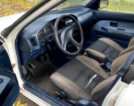 Белый Тойота Королла, объемом двигателя 1.6 л и пробегом 490 тыс. км за 850 $, фото 5 на Automoto.ua