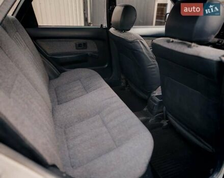 Белый Тойота Королла, объемом двигателя 1.3 л и пробегом 270 тыс. км за 1300 $, фото 11 на Automoto.ua