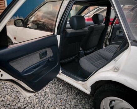 Белый Тойота Королла, объемом двигателя 1.3 л и пробегом 300 тыс. км за 1300 $, фото 15 на Automoto.ua