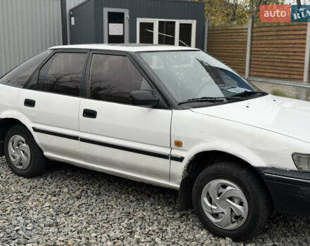 Білий Тойота Королла, об'ємом двигуна 1.3 л та пробігом 300 тис. км за 1300 $, фото 3 на Automoto.ua