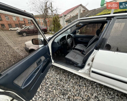 Білий Тойота Королла, об'ємом двигуна 1.3 л та пробігом 300 тис. км за 1300 $, фото 9 на Automoto.ua