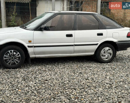 Білий Тойота Королла, об'ємом двигуна 1.3 л та пробігом 300 тис. км за 1300 $, фото 4 на Automoto.ua