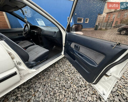 Белый Тойота Королла, объемом двигателя 1.3 л и пробегом 350 тыс. км за 1200 $, фото 19 на Automoto.ua