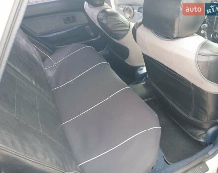 Білий Тойота Королла, об'ємом двигуна 1.3 л та пробігом 300 тис. км за 1100 $, фото 1 на Automoto.ua