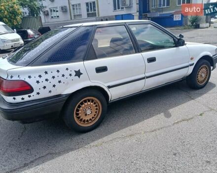 Білий Тойота Королла, об'ємом двигуна 1.3 л та пробігом 300 тис. км за 1100 $, фото 6 на Automoto.ua
