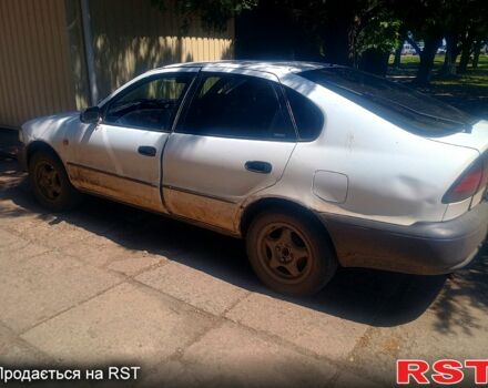 Белый Тойота Королла, объемом двигателя 1.3 л и пробегом 462 тыс. км за 1560 $, фото 1 на Automoto.ua