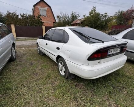 Белый Тойота Королла, объемом двигателя 1.4 л и пробегом 250 тыс. км за 1500 $, фото 2 на Automoto.ua