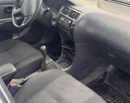 Белый Тойота Королла, объемом двигателя 1.4 л и пробегом 250 тыс. км за 1500 $, фото 1 на Automoto.ua