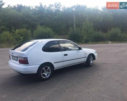 Белый Тойота Королла, объемом двигателя 1.3 л и пробегом 231 тыс. км за 1800 $, фото 2 на Automoto.ua