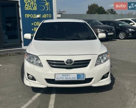 Білий Тойота Королла, об'ємом двигуна 1.6 л та пробігом 204 тис. км за 6990 $, фото 1 на Automoto.ua