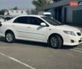 Білий Тойота Королла, об'ємом двигуна 1.6 л та пробігом 204 тис. км за 6990 $, фото 3 на Automoto.ua