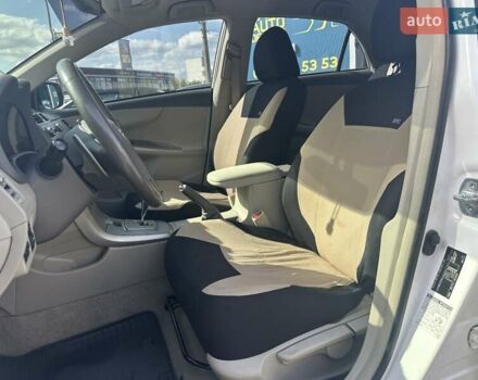 Білий Тойота Королла, об'ємом двигуна 1.6 л та пробігом 204 тис. км за 6990 $, фото 12 на Automoto.ua