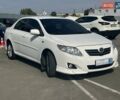 Білий Тойота Королла, об'ємом двигуна 1.6 л та пробігом 204 тис. км за 6990 $, фото 2 на Automoto.ua