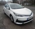 Белый Тойота Королла, объемом двигателя 1.3 л и пробегом 179 тыс. км за 10500 $, фото 1 на Automoto.ua