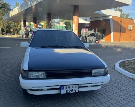 Белый Тойота Королла, объемом двигателя 1.3 л и пробегом 235 тыс. км за 1350 $, фото 3 на Automoto.ua