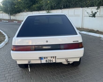 Белый Тойота Королла, объемом двигателя 1.3 л и пробегом 235 тыс. км за 1350 $, фото 7 на Automoto.ua