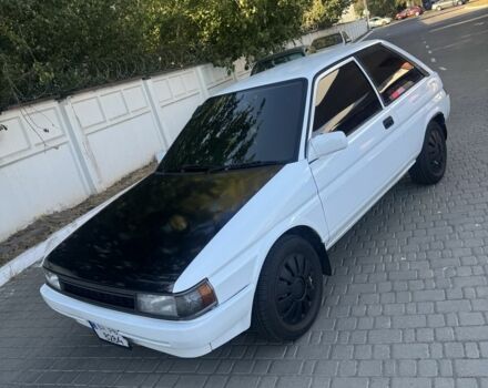 Белый Тойота Королла, объемом двигателя 1.3 л и пробегом 235 тыс. км за 1350 $, фото 4 на Automoto.ua