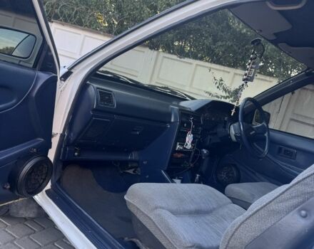 Белый Тойота Королла, объемом двигателя 1.3 л и пробегом 235 тыс. км за 1350 $, фото 9 на Automoto.ua