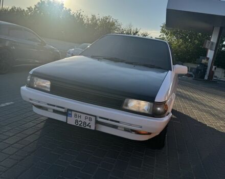 Белый Тойота Королла, объемом двигателя 1.3 л и пробегом 235 тыс. км за 1350 $, фото 1 на Automoto.ua