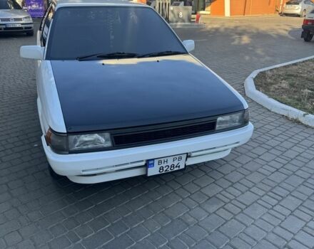 Белый Тойота Королла, объемом двигателя 1.3 л и пробегом 235 тыс. км за 1350 $, фото 6 на Automoto.ua