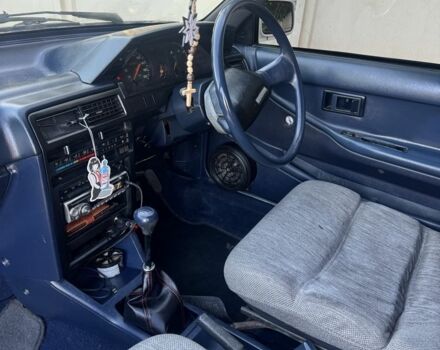 Белый Тойота Королла, объемом двигателя 1.3 л и пробегом 235 тыс. км за 1350 $, фото 10 на Automoto.ua