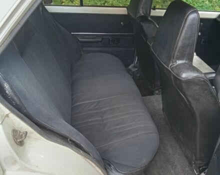 Белый Тойота Королла, объемом двигателя 1.3 л и пробегом 238 тыс. км за 595 $, фото 7 на Automoto.ua