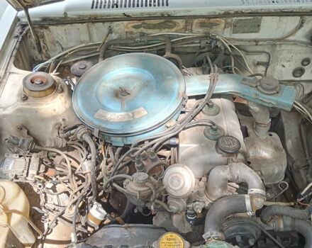 Белый Тойота Королла, объемом двигателя 1.3 л и пробегом 238 тыс. км за 595 $, фото 5 на Automoto.ua