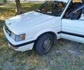 Белый Тойота Королла, объемом двигателя 1.5 л и пробегом 230 тыс. км за 1500 $, фото 4 на Automoto.ua