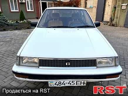 Білий Тойота Королла, об'ємом двигуна 1.5 л та пробігом 260 тис. км за 828 $, фото 1 на Automoto.ua