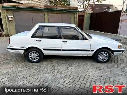 Білий Тойота Королла, об'ємом двигуна 1.5 л та пробігом 260 тис. км за 828 $, фото 2 на Automoto.ua