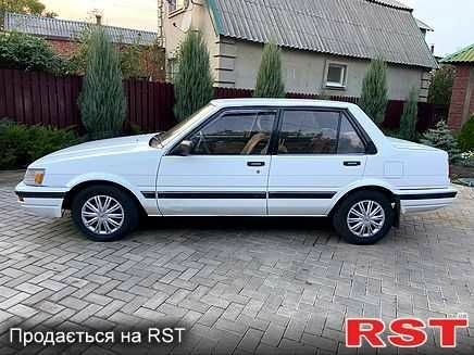 Білий Тойота Королла, об'ємом двигуна 1.5 л та пробігом 260 тис. км за 828 $, фото 6 на Automoto.ua