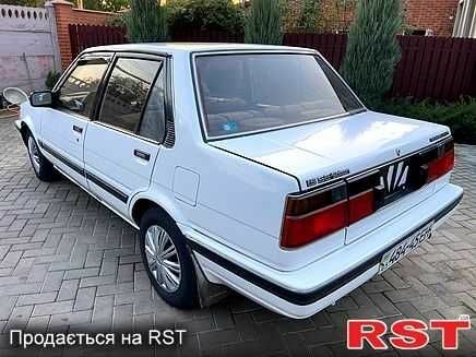 Білий Тойота Королла, об'ємом двигуна 1.5 л та пробігом 260 тис. км за 828 $, фото 4 на Automoto.ua