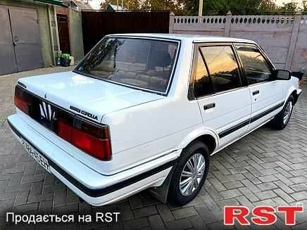 Білий Тойота Королла, об'ємом двигуна 1.5 л та пробігом 260 тис. км за 828 $, фото 3 на Automoto.ua