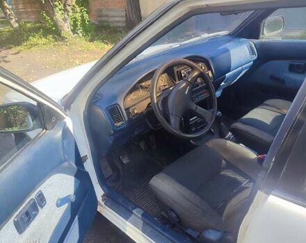 Белый Тойота Королла, объемом двигателя 1.59 л и пробегом 400 тыс. км за 800 $, фото 1 на Automoto.ua