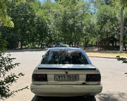 Білий Тойота Королла, об'ємом двигуна 1.5 л та пробігом 235 тис. км за 350 $, фото 5 на Automoto.ua