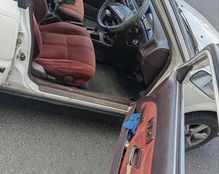 Белый Тойота Королла, объемом двигателя 1 л и пробегом 300 тыс. км за 1250 $, фото 2 на Automoto.ua