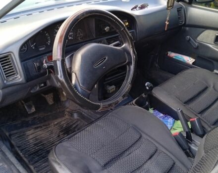 Белый Тойота Королла, объемом двигателя 1.3 л и пробегом 360 тыс. км за 1850 $, фото 7 на Automoto.ua