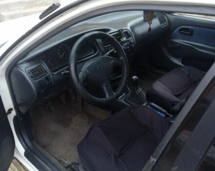 Білий Тойота Королла, об'ємом двигуна 1.3 л та пробігом 340 тис. км за 1900 $, фото 4 на Automoto.ua