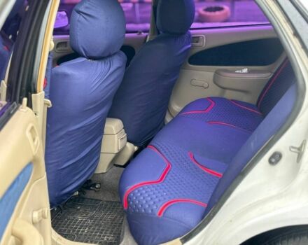 Белый Тойота Королла, объемом двигателя 1.3 л и пробегом 200 тыс. км за 2200 $, фото 6 на Automoto.ua