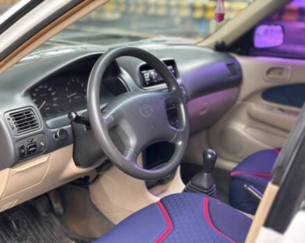 Белый Тойота Королла, объемом двигателя 1.3 л и пробегом 200 тыс. км за 2200 $, фото 5 на Automoto.ua