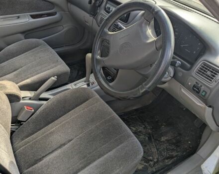 Белый Тойота Королла, объемом двигателя 1.5 л и пробегом 150 тыс. км за 2000 $, фото 2 на Automoto.ua