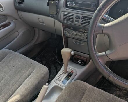 Белый Тойота Королла, объемом двигателя 1.5 л и пробегом 150 тыс. км за 2000 $, фото 3 на Automoto.ua